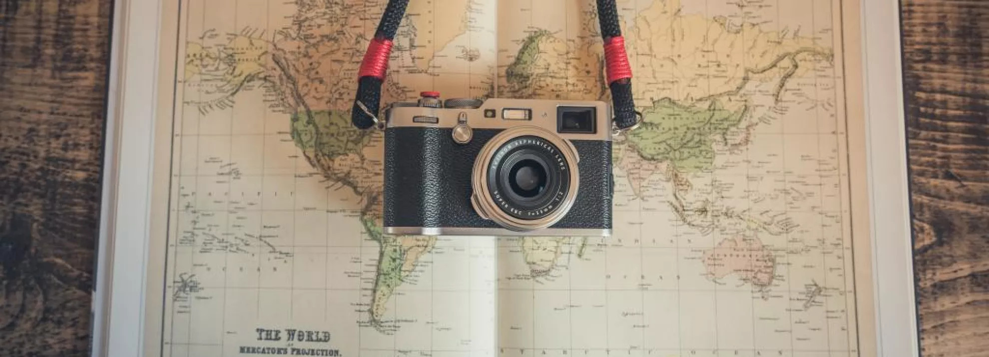 Camera hanging over world map
