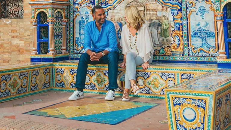 Guests enjoying the stunning artwork of Moroccan mosaics.