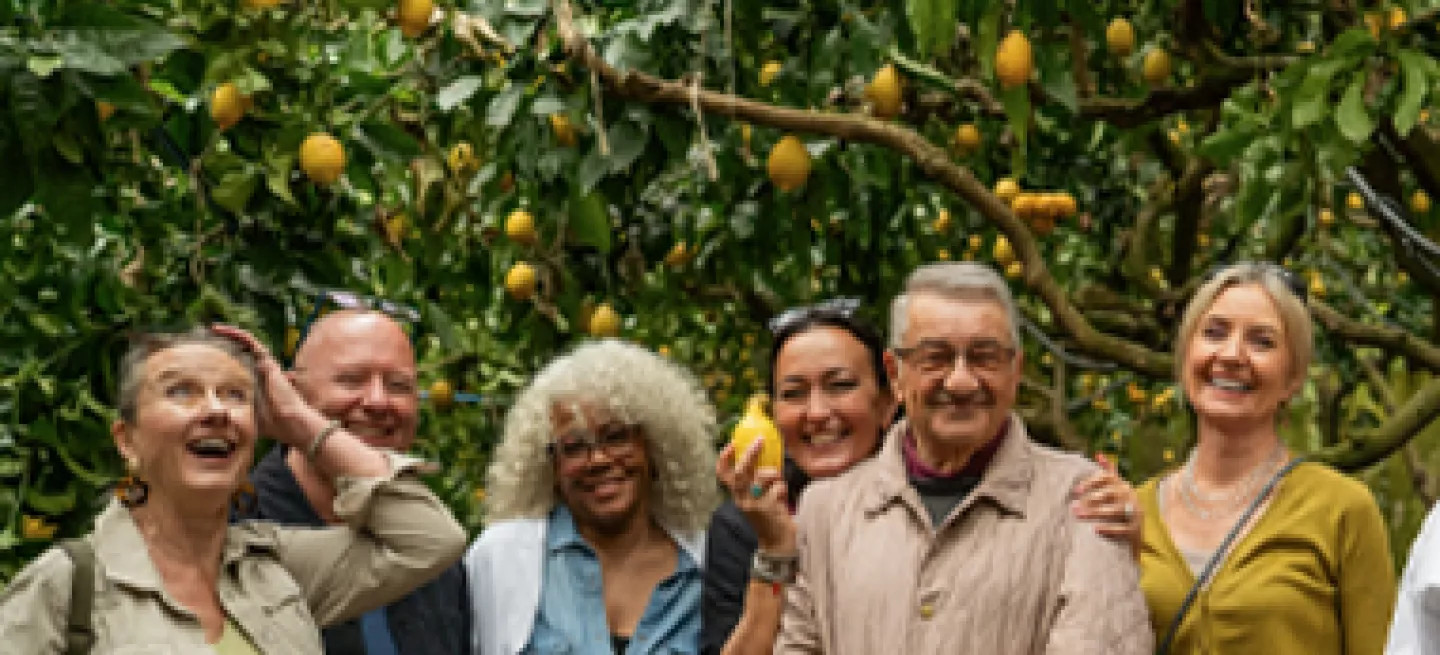 Guests enjoying a tour experience at the Lemon Grove on the Amalfi Coast.