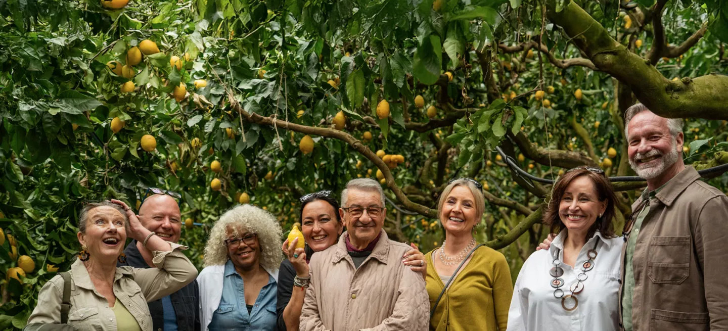 Guests enjoying a tour experience at the Lemon Grove on the Amalfi Coast.