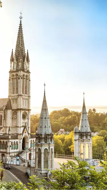 A view of the Sanctuary of Our Lady of Lourdes, a prominent shrine and site welcoming Catholic Pilgrims.
