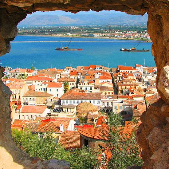 A view through the walls of the Fortress of Palamidi overlooking the town of Nafplio.