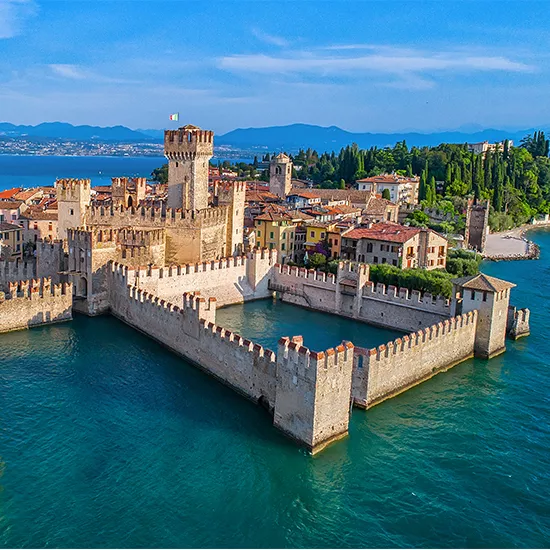An overhead view of the Castello Scaligero di Sirmione in the town of Sirmione in Italy.