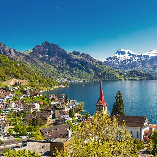 A grand view of the beautiful Lake Lucerne and the waterfront town of Weggis.