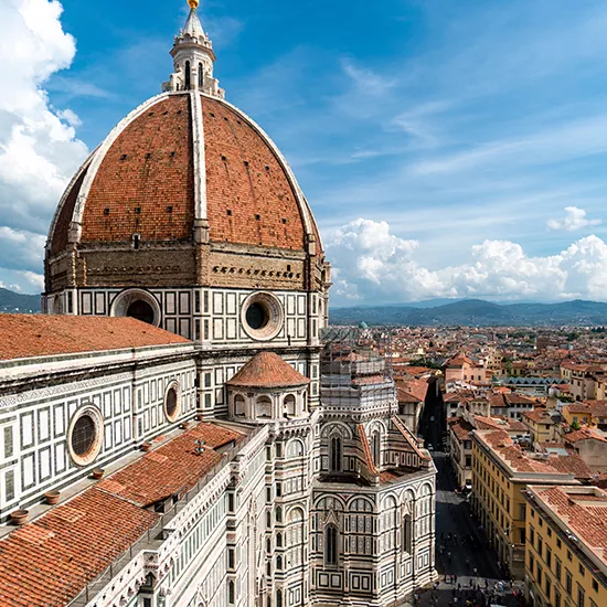 A view of the the Grand Brunelleschi's dome overlooking Florence, a part of the grand Cathedral Santa Maria Del Fiore.